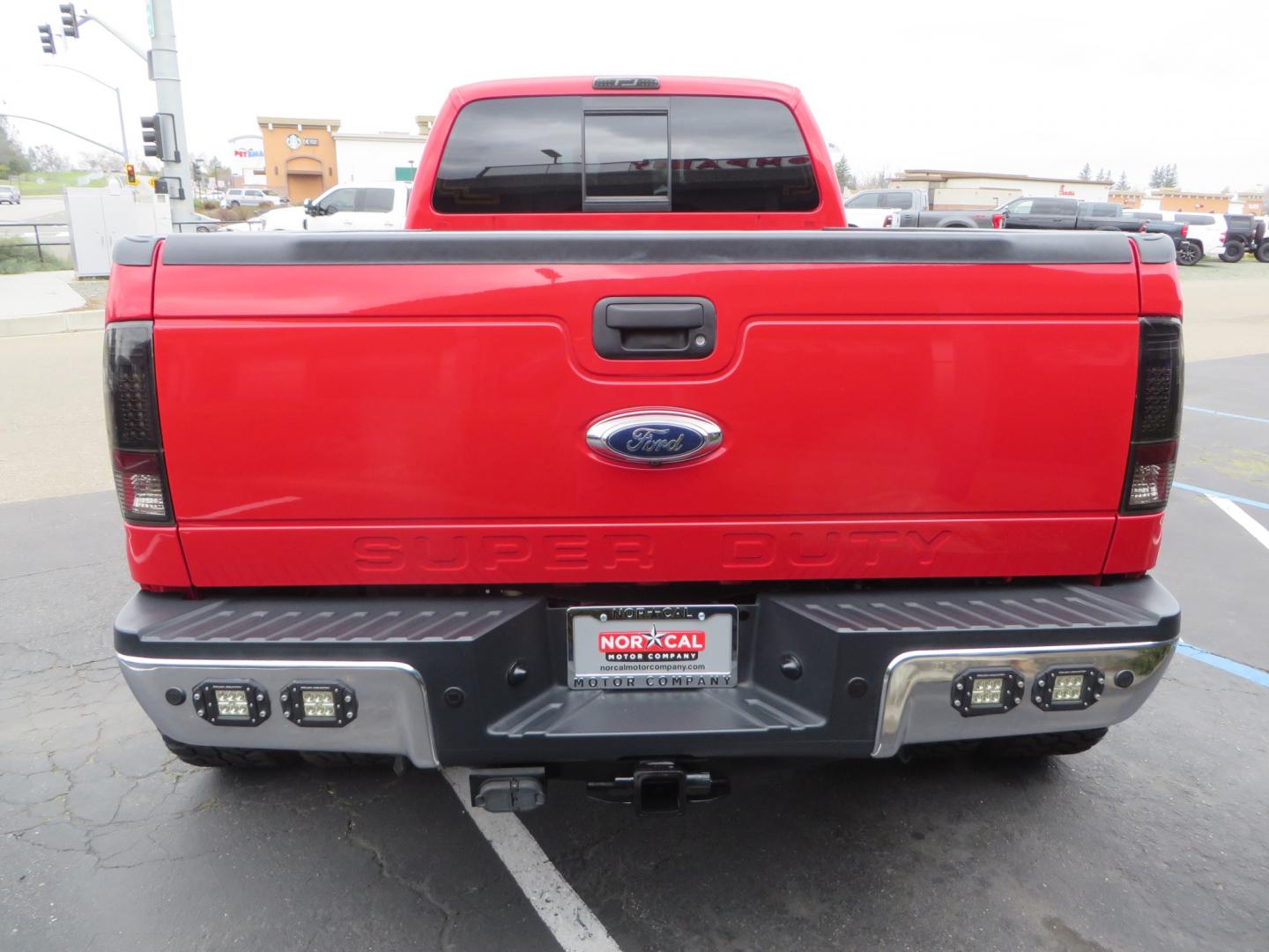 2014 Red /TAN Ford F450 Super Duty Crew Cab Lariat Crew Cab 4WD (1FT8W4DT7EE) with an V8 Turbo Diesel 6.7 Liter engine, Automatic 6-Spd w/SelectShift transmission, located at 2630 Grass Valley Highway, Auburn, CA, 95603, (530) 508-5100, 38.937893, -121.095482 - Wow!! 14 F450 sitting on Icon Vehicle Dynamics suspension, 24" American Force wheels, 37" tires, Rough Country back up leds, Light bar, Window tint, Smoked tail lights 3rd brake light, cab lights, and marker lights, Air bags with compressor, and train horns. Must see this head turner! - Photo#5